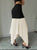 Monochrome Majesty Pleated Asymmetrical Skirt