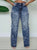 Crossed Out Distressed Patchwork Denim