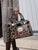 Fierce Leopard-Print Crocodile Texture Handbag with Gold Turn-Lock & Glossy Finish