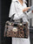 Fierce Leopard-Print Crocodile Texture Handbag with Gold Turn-Lock & Glossy Finish