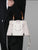 Elegant Crocodile-Embossed White Handbag with Wooden Handle & Modern Buckle Detail